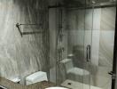 Modern bathroom with glass shower enclosure