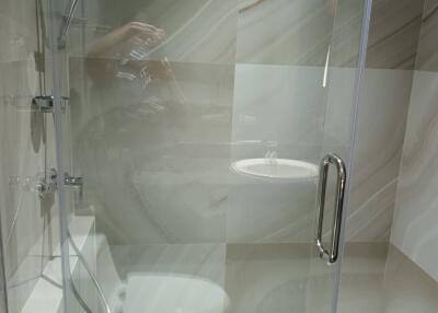 Modern bathroom with glass shower enclosure