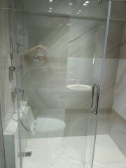 Modern bathroom with glass shower enclosure