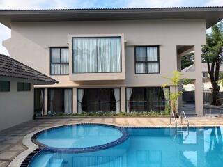 Backyard with modern house and swimming pool