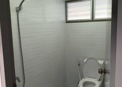 Bathroom with toilet and shower