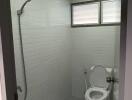 Bathroom with toilet and shower