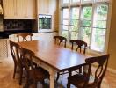 Cozy dining area with wooden table and chairs