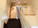 Staircase with decorative tree mural