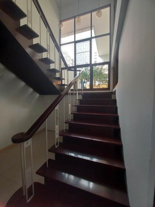 Modern staircase with large windows