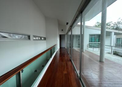 Corridor with glass window showcasing a modern exterior