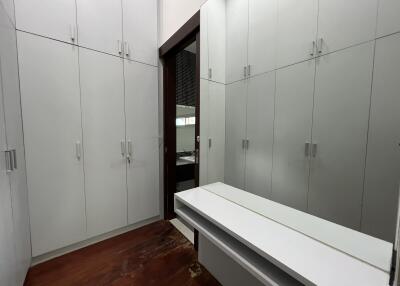 Spacious walk-in closet with ample storage