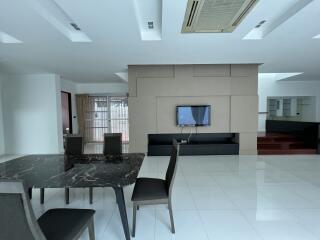 Spacious and modern living room with dining area