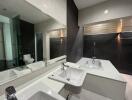 Modern bathroom with bathtub, sink, and toilet