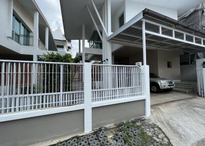 Front view of modern house with carport