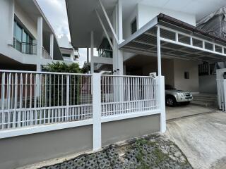 Front view of modern house with carport