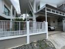 Front view of modern house with carport