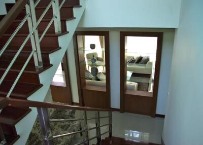 Staircase leading to a living area