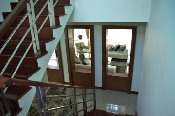 Staircase leading to a living area