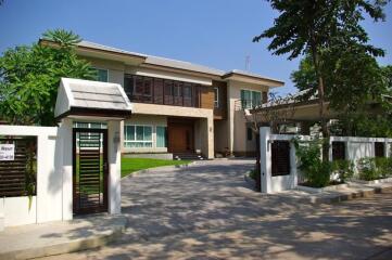 Two-story modern house with driveway