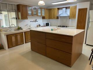 Spacious kitchen with a large island and modern appliances