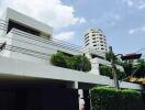 Exterior view of a modern building with greenery