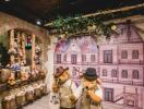 Teddy bear themed store with decorative house background