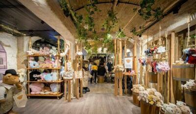 A rustic-themed shop showcasing stuffed animals and plush toys