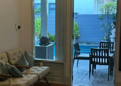 Living area with view to the outdoor patio