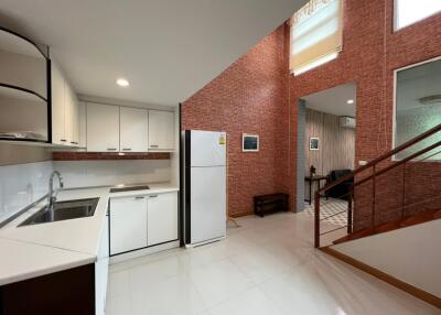 Modern kitchen and adjacent living area