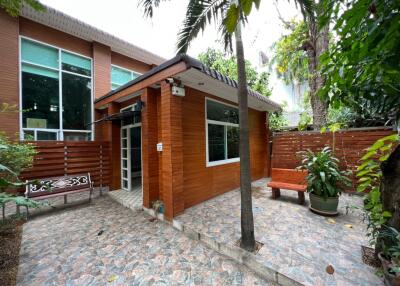 Outdoor garden area with wooden exterior