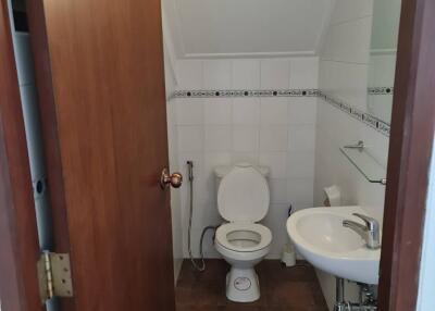 Small bathroom with white tiles