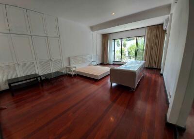 spacious living room with wooden floor