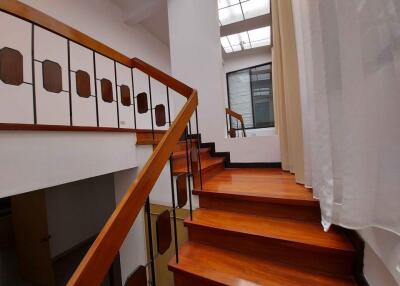 Wooden staircase with elegant railing design