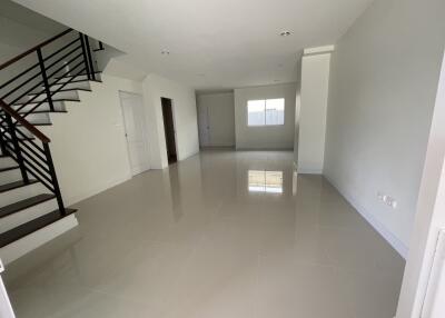 Spacious main living area with staircase