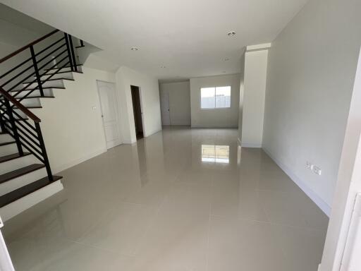 Spacious main living area with staircase