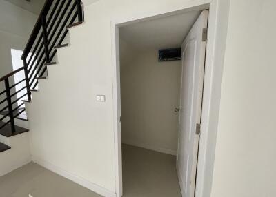 Storage room under stairs