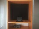 Built-in desk unit with laptop and storage space