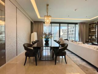 Modern living room with dining area and large windows