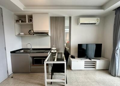 Compact kitchen and dining area with modern amenities