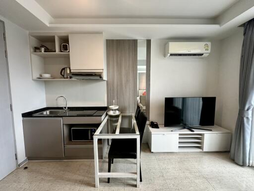 Compact kitchen and dining area with modern amenities