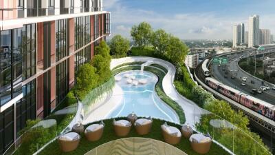 Outdoor pool area in a modern building with city view