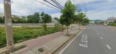 Street view with sidewalk and trees