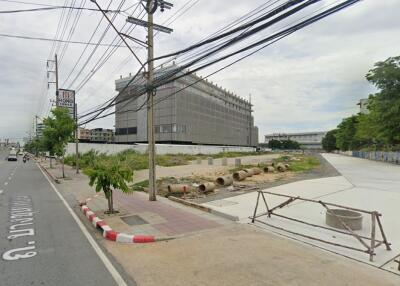 Road view with building and construction site