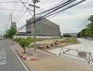 Road view with building and construction site