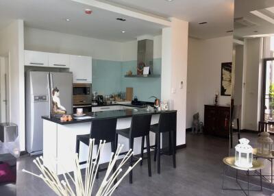 Modern kitchen with island and bar stools