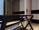 Modern hallway with a console table and mirrored wall