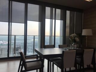 Modern dining area with a city view