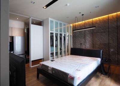 Modern bedroom with wardrobe and lighting