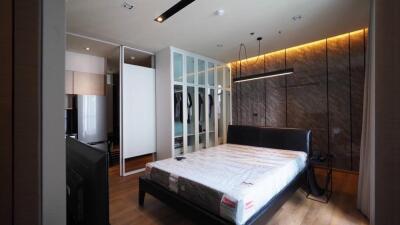 Modern bedroom with wardrobe and lighting