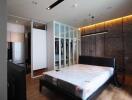 Modern bedroom with wardrobe and lighting