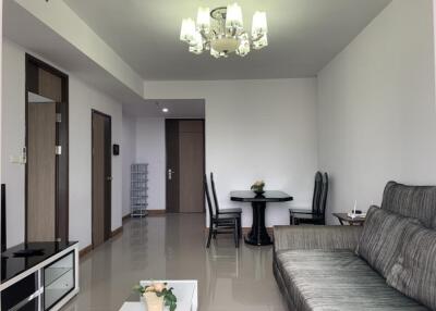 Modern living room with chandelier and furniture