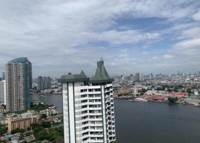 Balcony view of cityscape and river