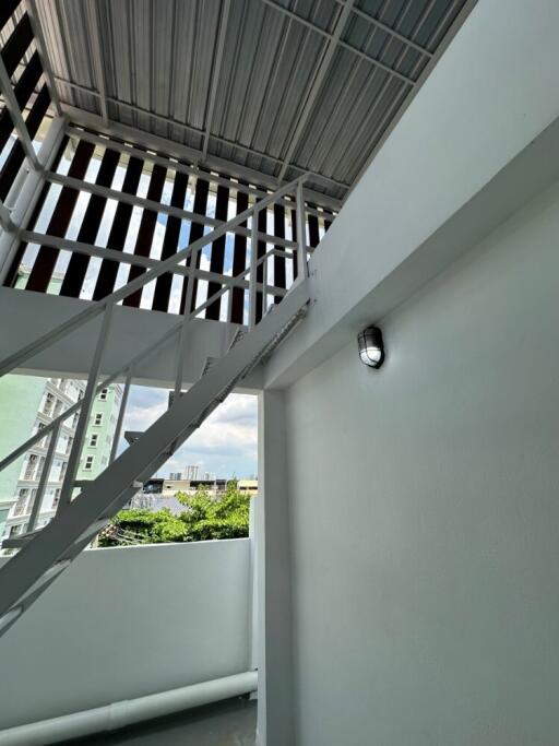 Staircase with outdoor view