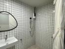 Modern bathroom with tiled walls and a sink